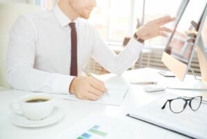 "A man at his computer developing his Customer Data Platform (CDP)